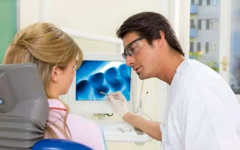 hamilton dentistry doctor explaining tooth test